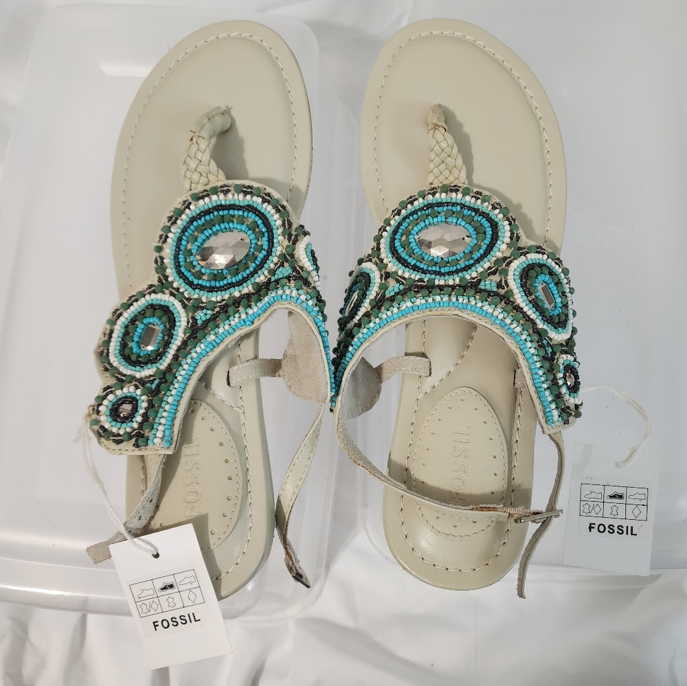 Never Worn Fossil sandals!